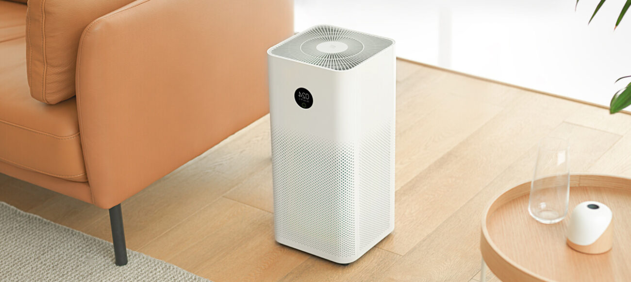 a white rectangular device on a wood floor